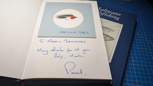 Signed and with a fly Signed and with a fly