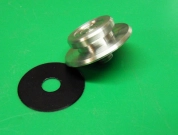 The locknut and the plastic ring to reduce friction between the locknut and the spool. The locknut and the plastic ring to reduce friction between the locknut and the spool.