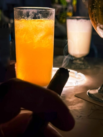 A well deserved cigar and a drink A well deserved cigar and a drink