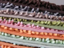 A pile of bathroom mats to server Mop fishing fly material