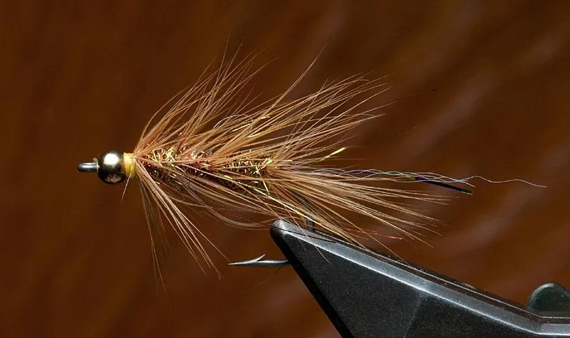 Brenda - The Brenda tied with light brown rooster hackle is a bright but still very harmonic fly. <a href=\"/patterns/brenda/\">See materials and full pattern description</a>.