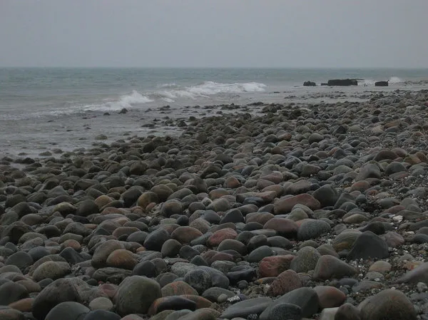 Windy, shallow, dirty - All this and more means rough conditions and challenging casting. These rocks were actually underwater the day before this -- and where we caught the fish.