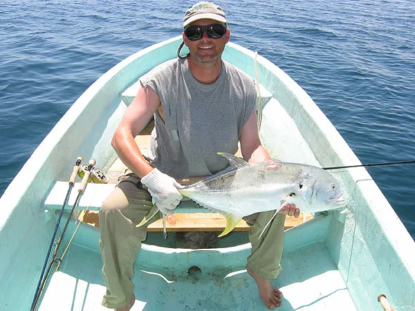 Jack and Martin - My first jack ever - like hooking a freight train! I judged this fish to be 8-10 lbs. or 4-5 kilos, but our guide Carlos insisted that it was much heavier - maybe even 6-7 kilos or more. Well, he knows and sure these fish are massive and can cheat a first timer like myself.